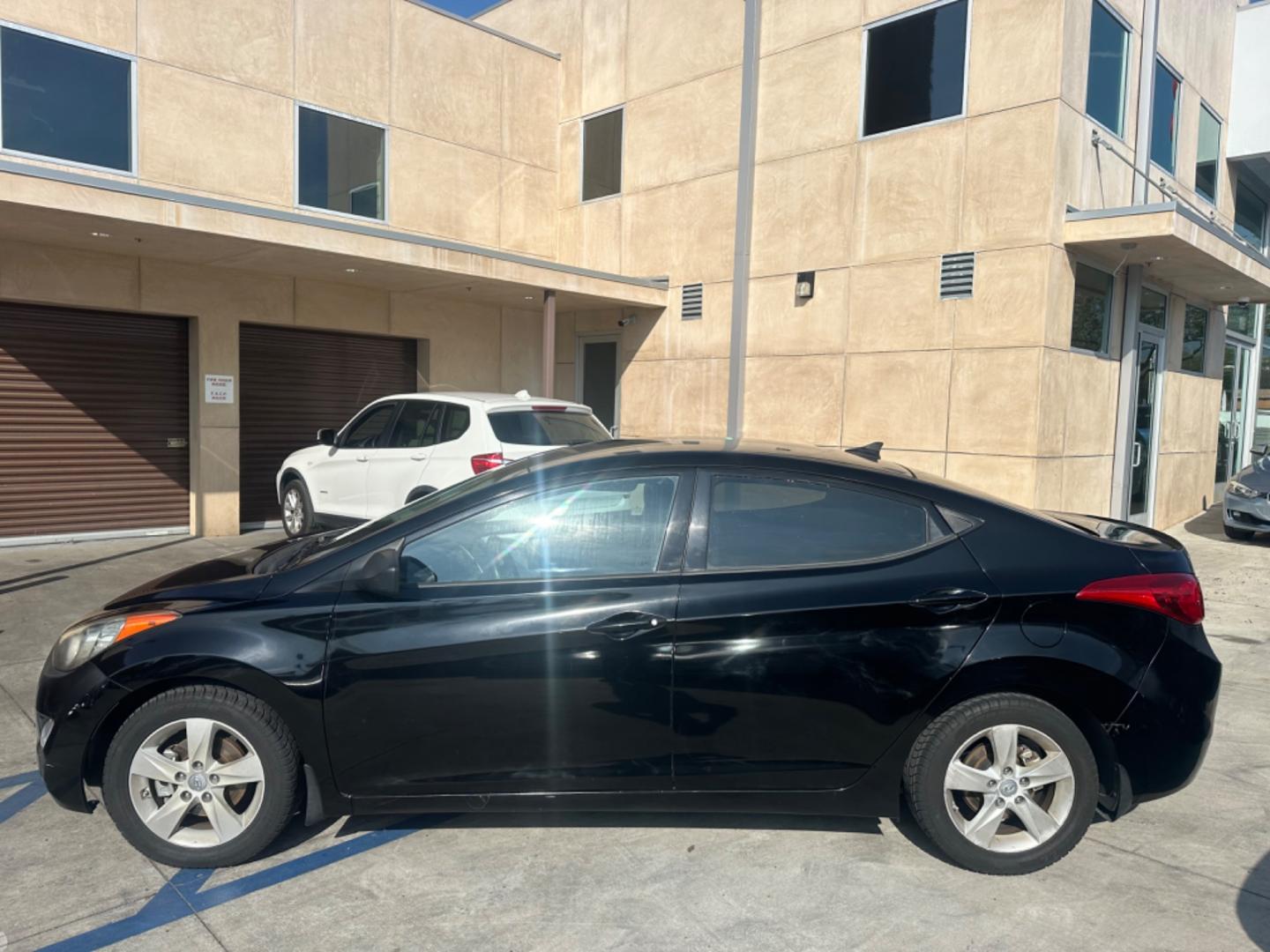 2013 Black /Black Hyundai Elantra (KMHDH4AE8DU) with an 4 Cylinder engine, Automatic transmission, located at 30 S. Berkeley Avenue, Pasadena, CA, 91107, (626) 248-7567, 34.145447, -118.109398 - Photo#1